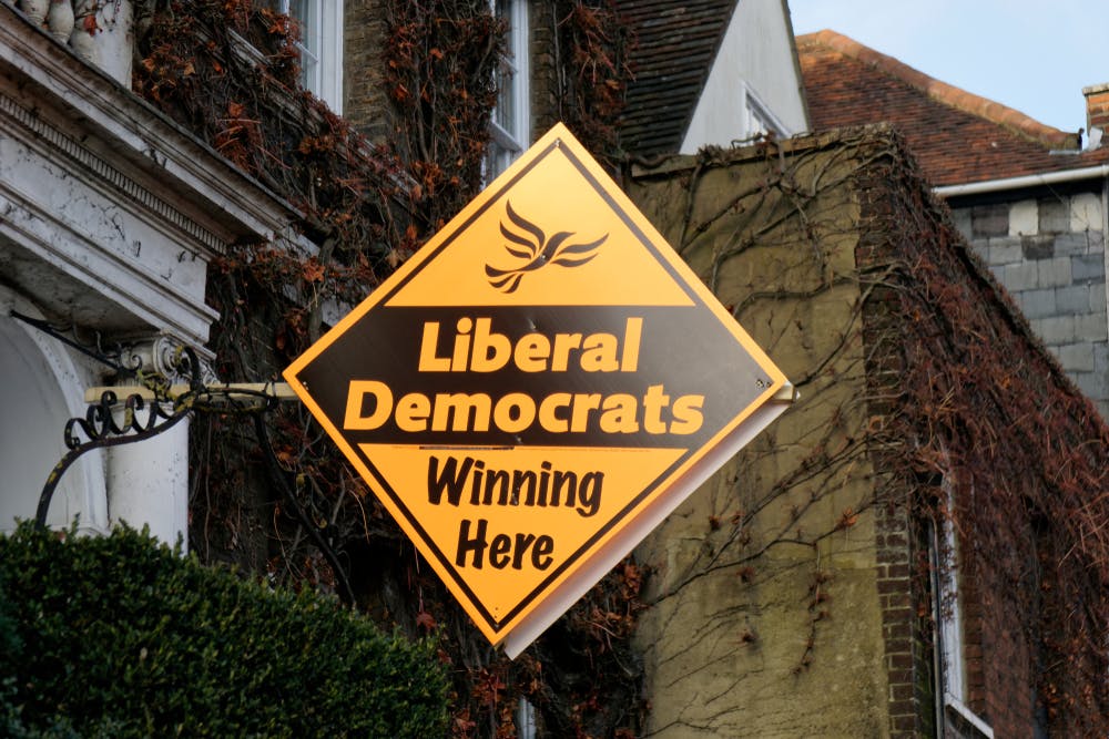 Sign outside a home reading Liberal Democrats Winning Here