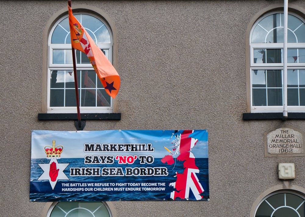 banner on a home reading Markethill says no to the northern ireland protocol
