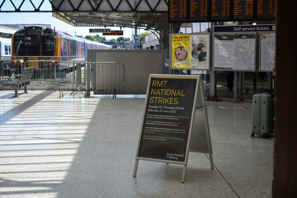 A sign at a train station reading RMT National Strikes