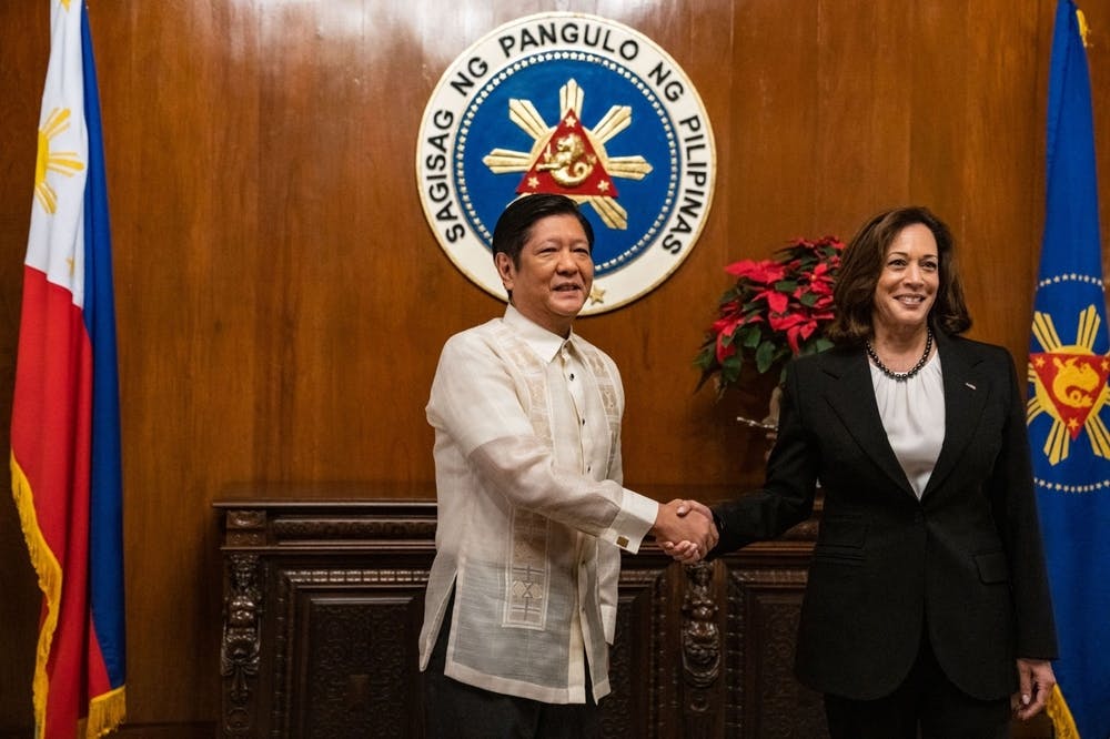 Ferdinand Marcos Jr shakes hands with Kamala Harris