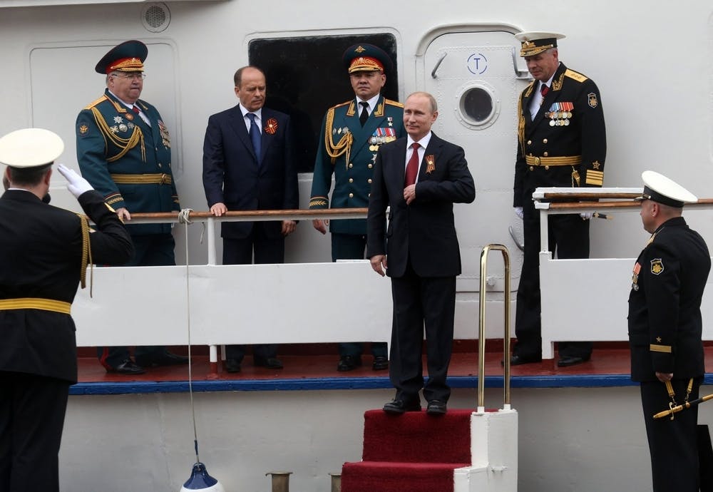 Vladimir Putin with military figures