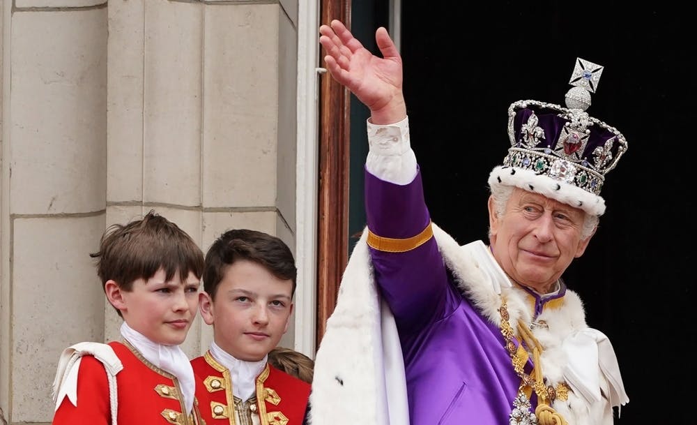 King Charles waves to crowds at his coronation