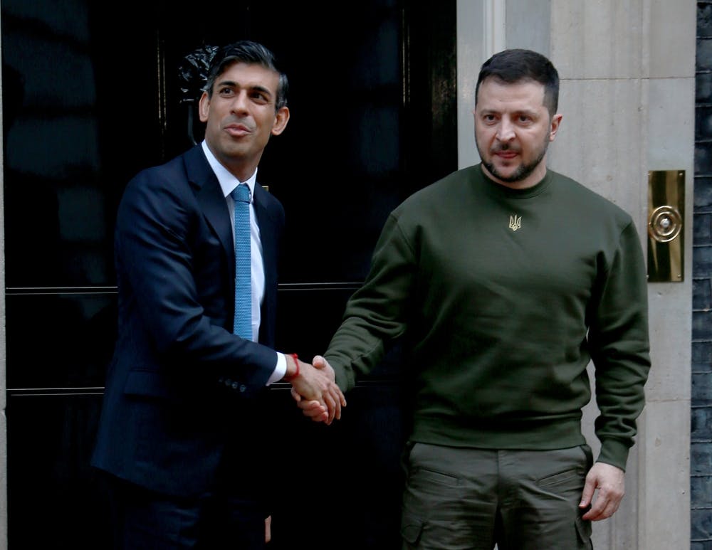 Rishi Sunak and Volodymyr Zelenskyy shake hands outside of Downing Street