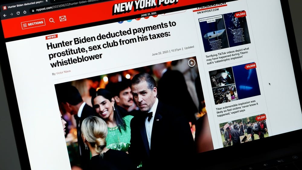 laptop screen with a New York Post article about Hunter Biden