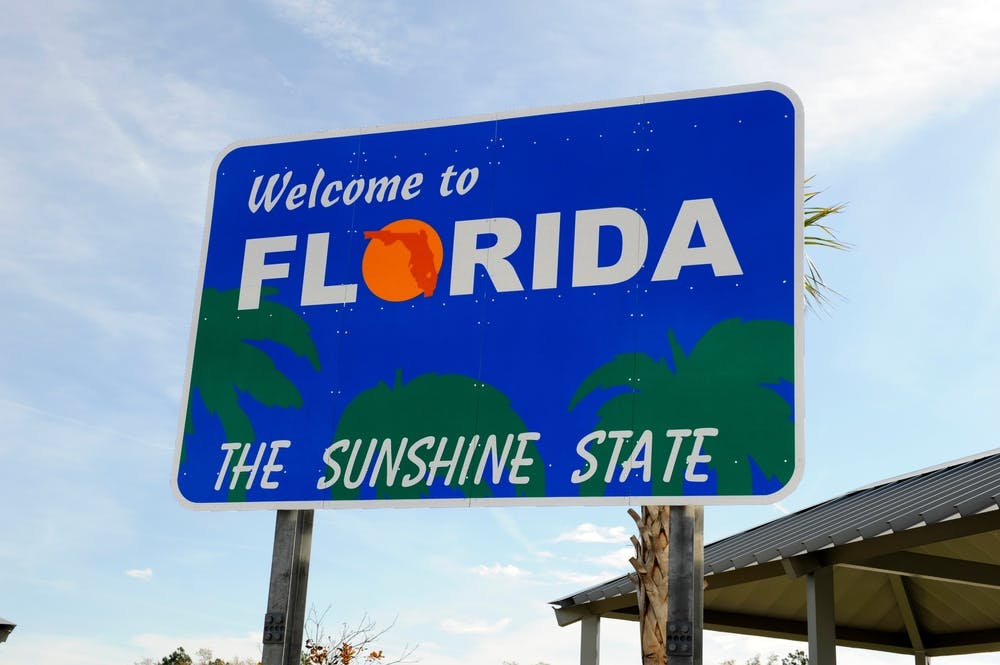Sign reading Welcome to Florida, the Sunshine State