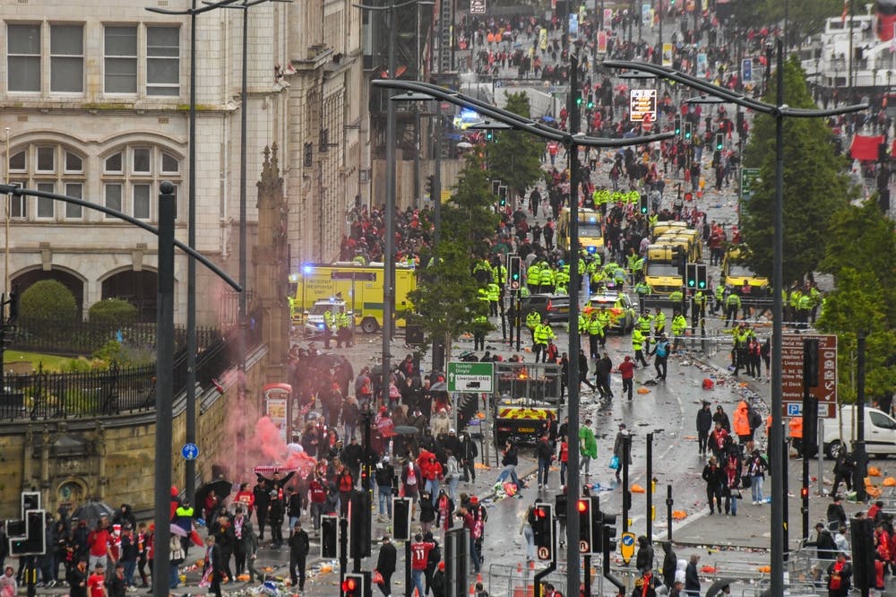 Emergency services attend the aftermath of the Liverpool parade crash